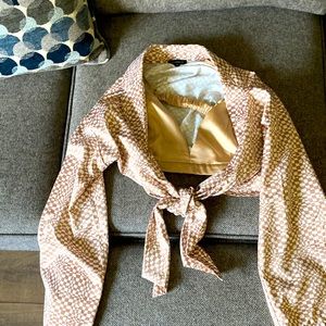 I’m selling a two piece shirt set in white and champagne.